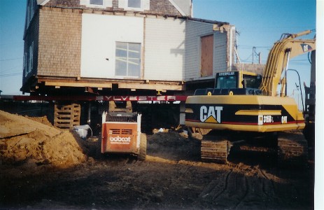 Demolition. This home was stripped back to inner walls and a new foundation was installed under the remaining structure.